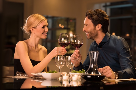 Romantic young couple at restaurant